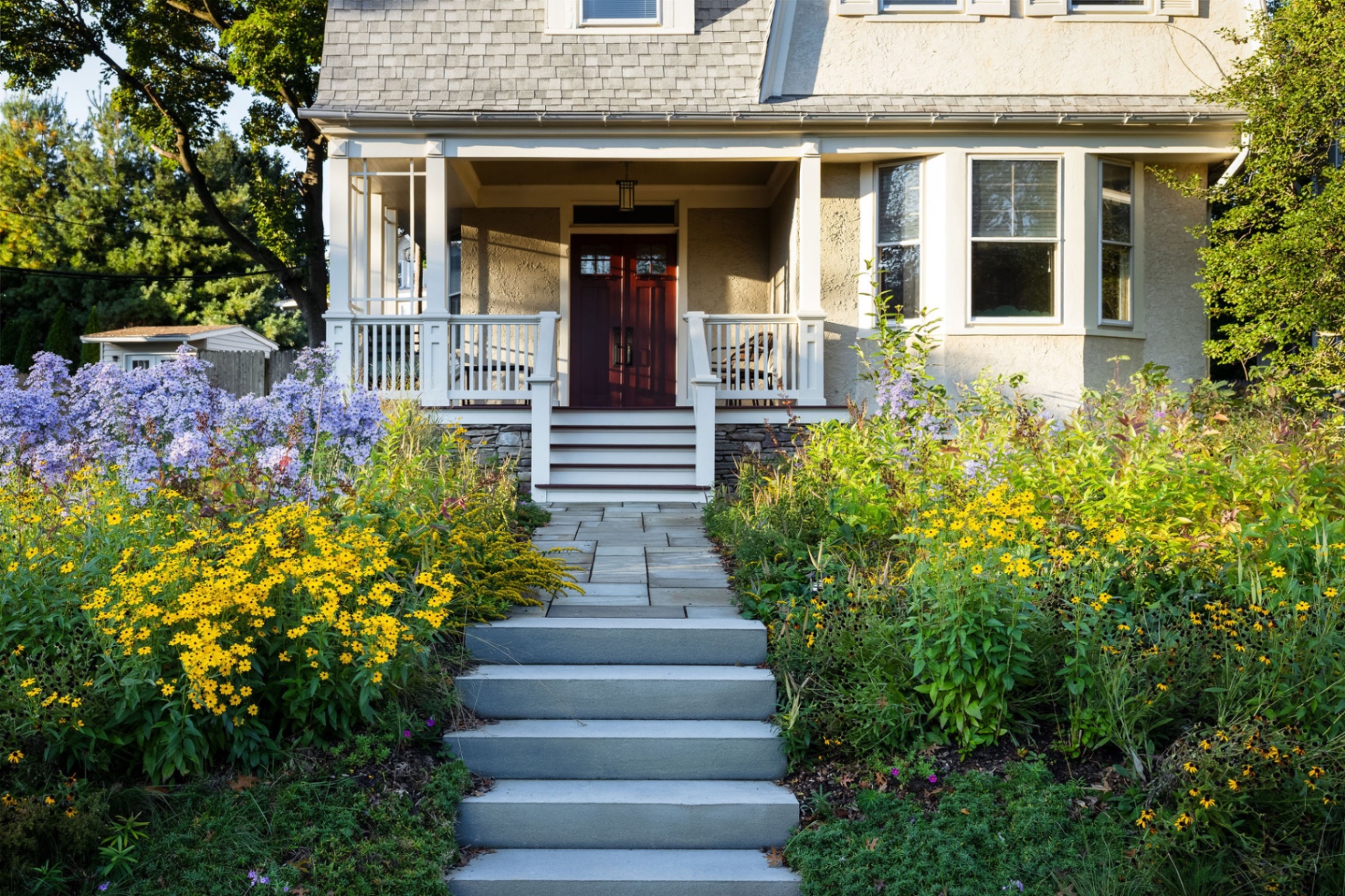 Native front-yard planting and renovated hardscape at a Bryn Mawr townhome